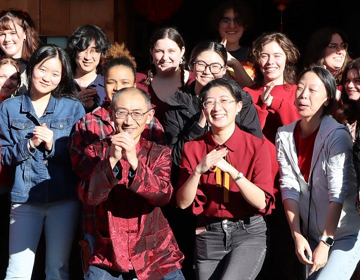 Faculty and students pose for group photo