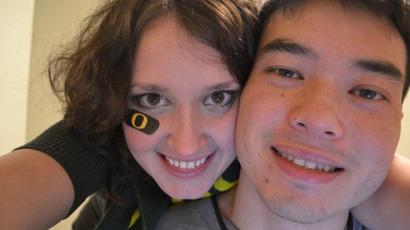 a man and woman smiling for a selfie