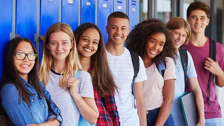 students lined up in front of lockers