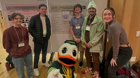 students at undergraduate research symposium with the Duck