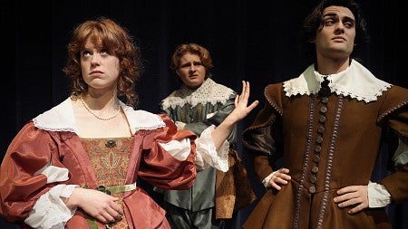 three students in character for shakespeare's much ado about nothing presented by university theatre