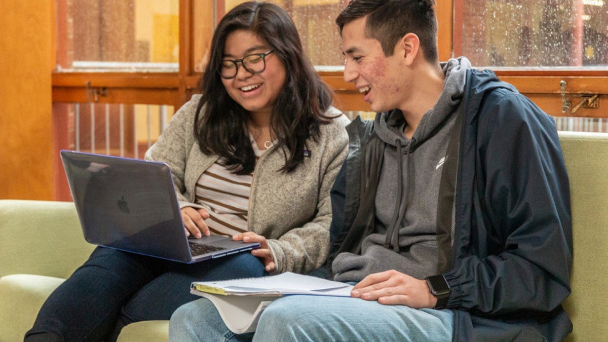 Students Studying on Couch