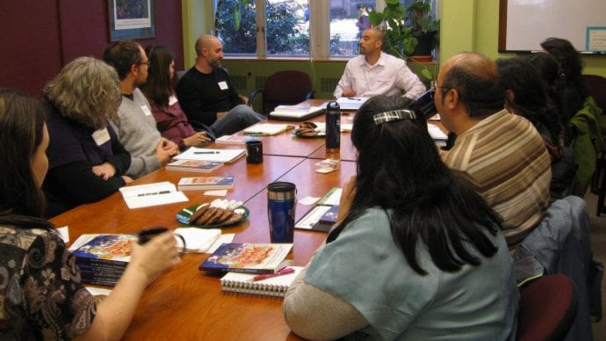 Oregon Humanities Center conference room with attendees meeting