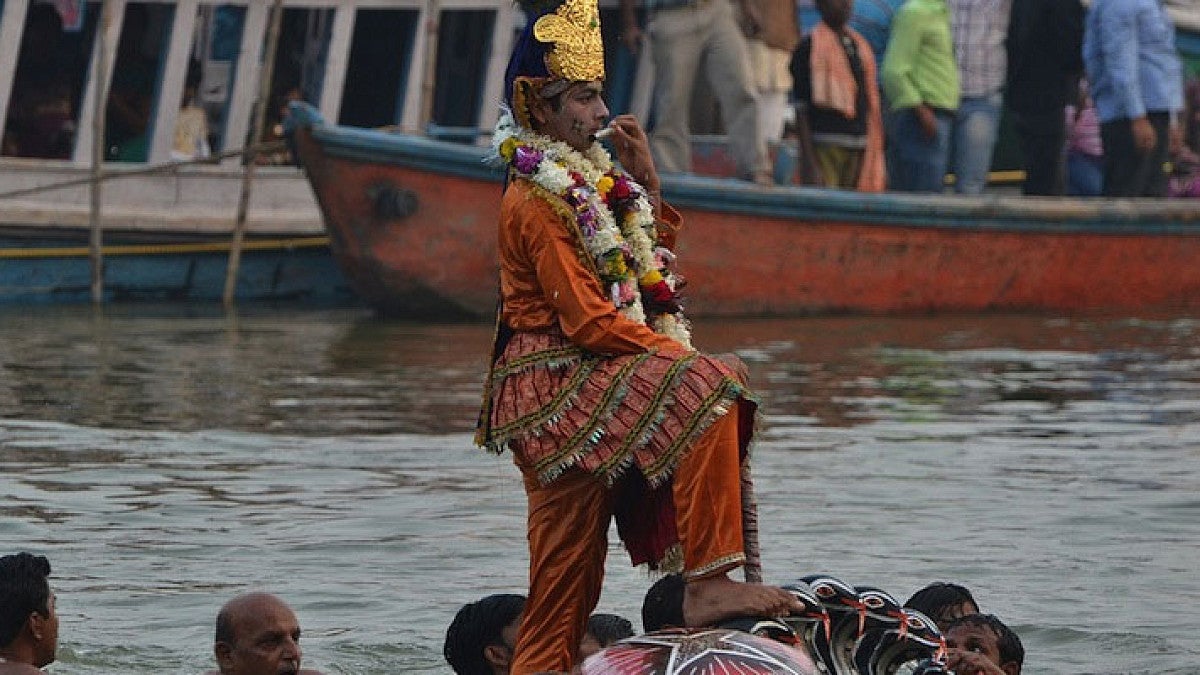 Teenager participating in religious ceremony