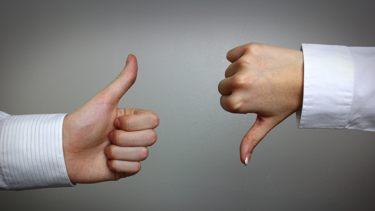 Two Thumbs, one up one down