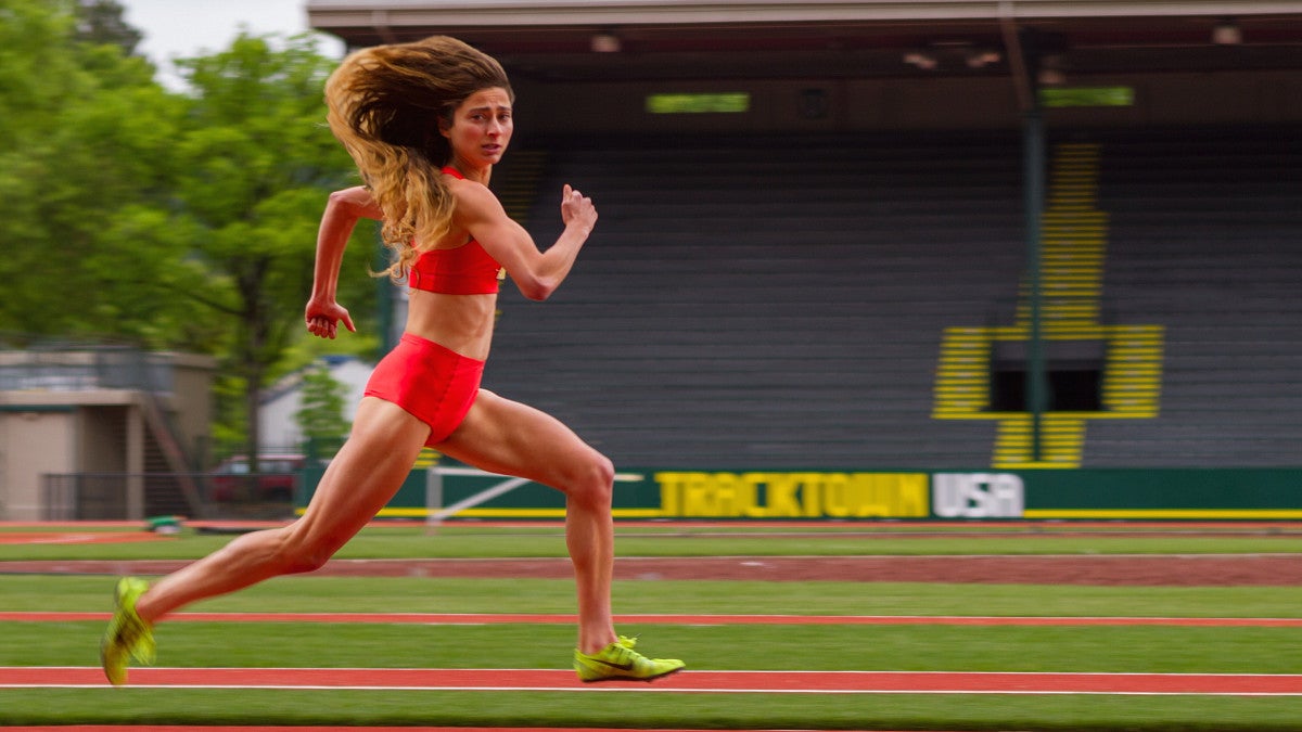 alexi pappas as plumb marigold running on the track in her movie tracktown