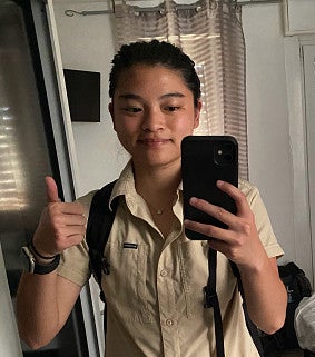 CAS student taking a selfie and giving a thumbs up