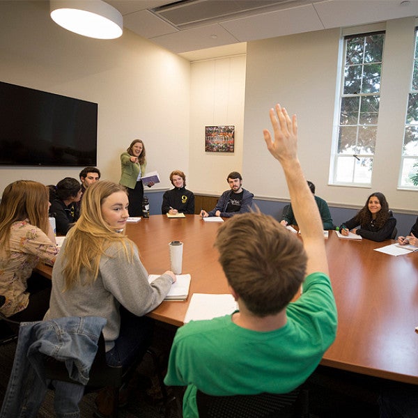 Student raising his hand