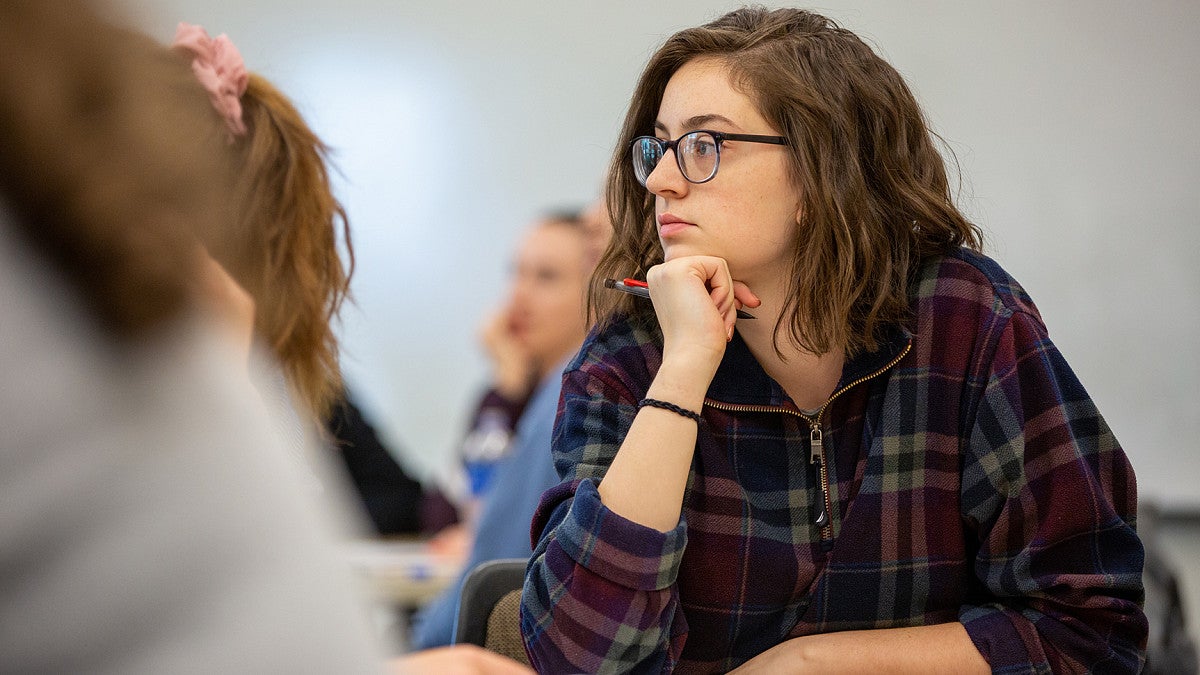 student looking seriously in classroom